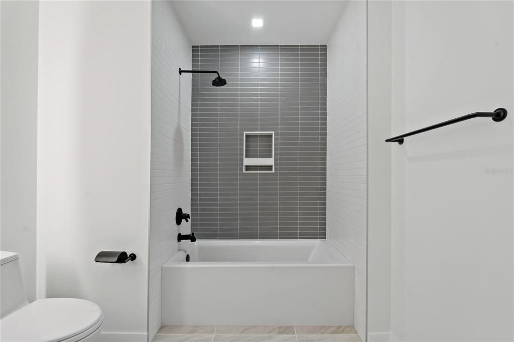 SHOWER/TUB COMBO IN GUEST BATHROOM!