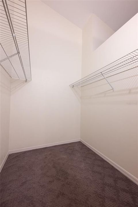 Primary room walk in closet