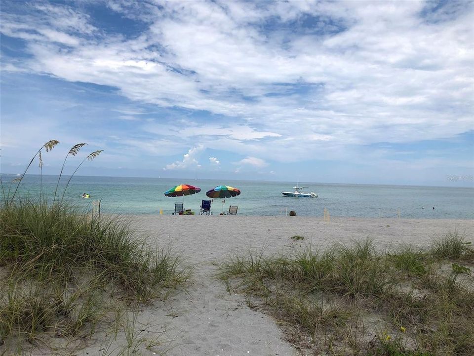 Nokomis Beach - just right for relaxing under an umbrella, listening to the waves or reading a good book.