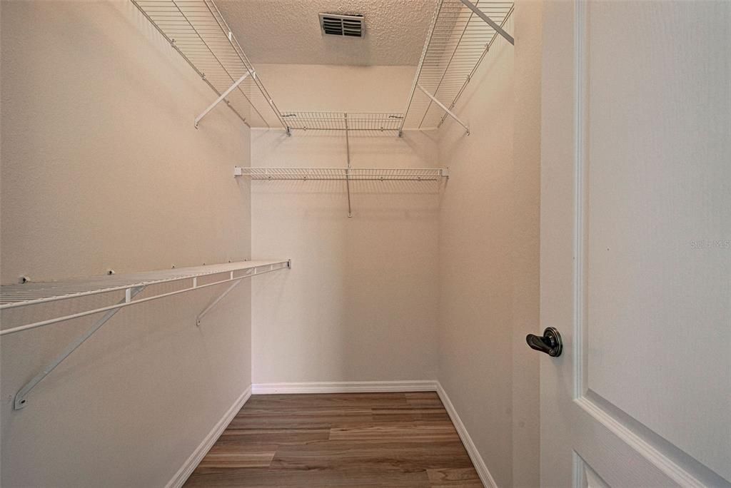 2nd bedroom's walk in closet so much storage in this wonderful home.