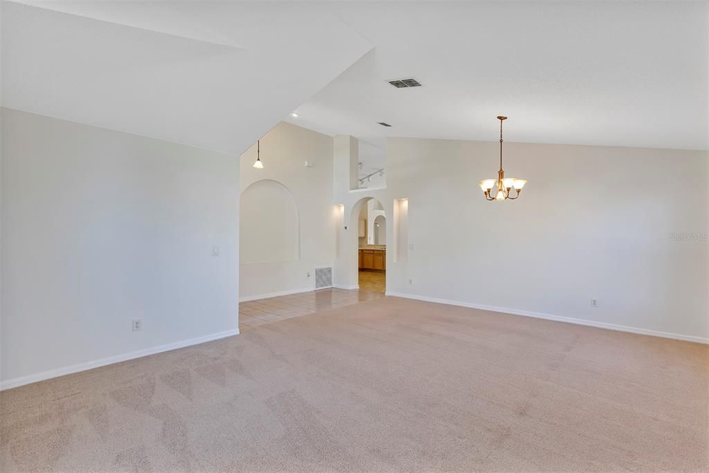 View from the Living Room through the Dining area towards Foyer and Kitchen