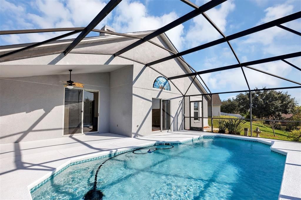 View from the Pool towards Primary Bedroom Sitting area and Family Room Entrance to the right