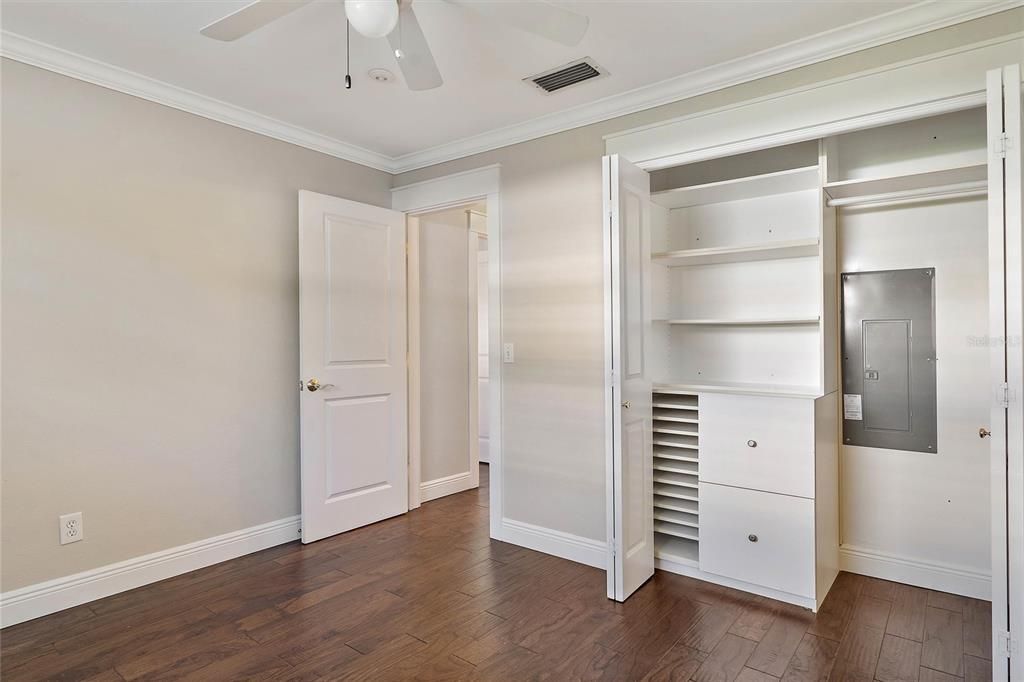 Additional view of the first guest room and closet.