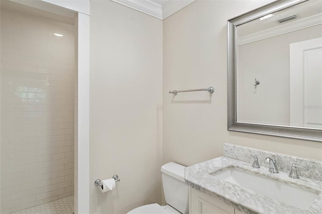 Updated en-suite bathroom vanity area and step-in shower.