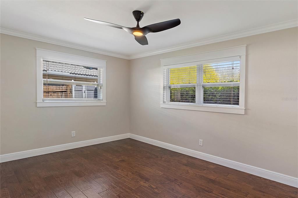 Oversized second guest room overlooking the side and front yard.