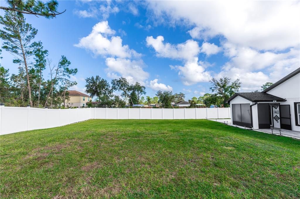 Vinyl privacy fenced for the huge yard