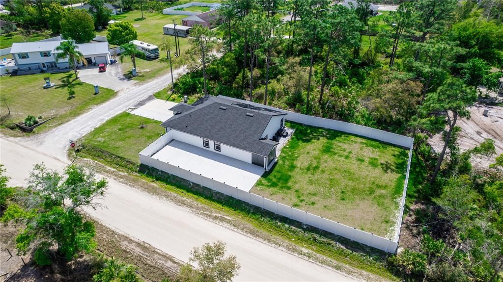 Huge corner lot fully fenced yard