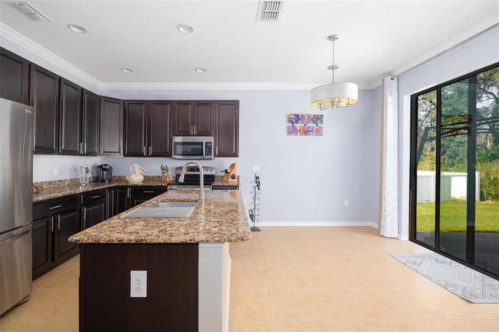 Kitchen and area for dining table