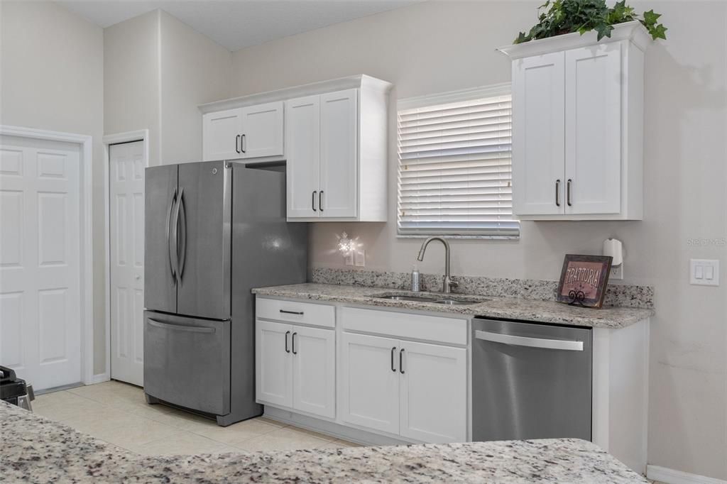 updated kitchen with stainless steel appliances