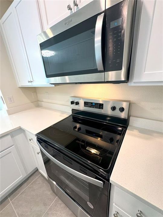 Kitchen - Stainless Steel Whirlpool Microwave & Range Stove