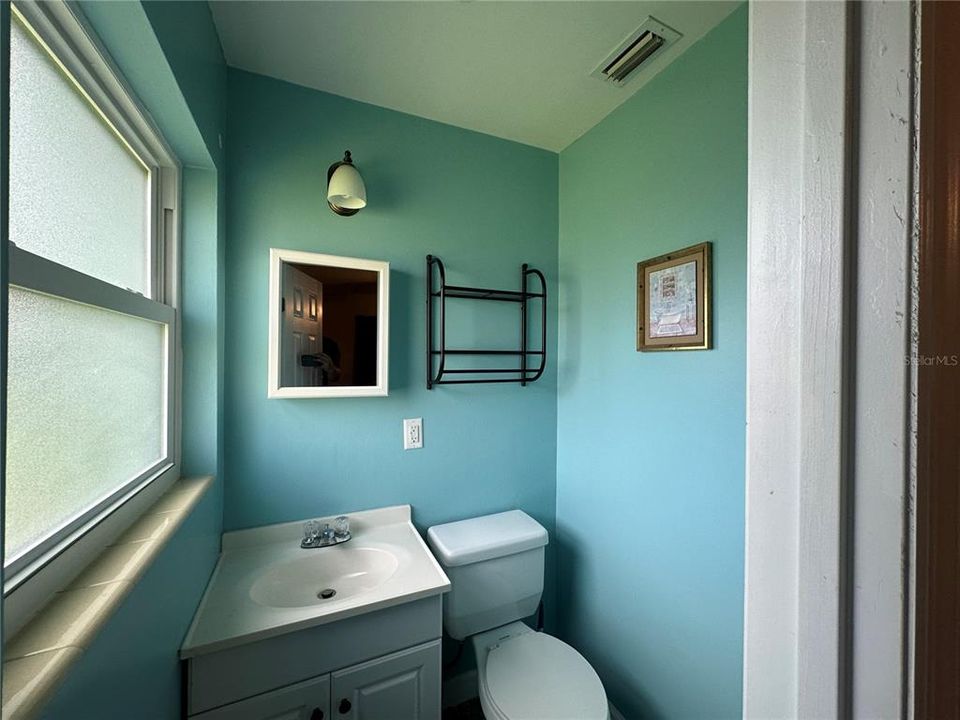 Primary bedroom half bathroom