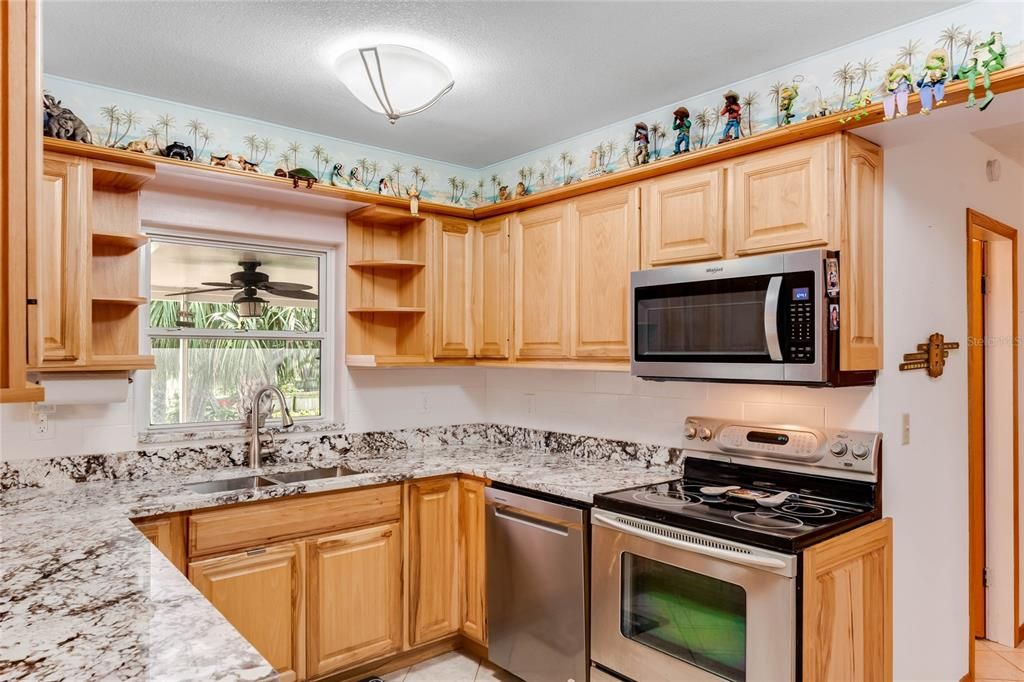 Updated Kitchen with Granite, S/S Appliances, Tile Back splash