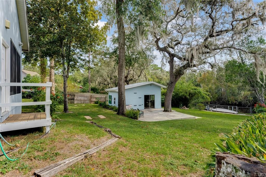 Large Yard Showing Work Shed and Dock