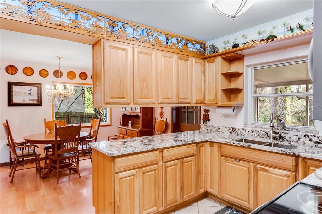 Kitchen Overlooking Dining Area and Porch