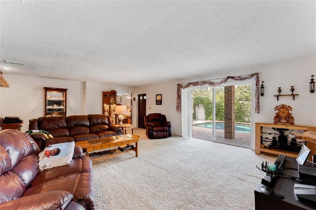 Family Room Overlooking Sliding Doors to Pool/Lanai