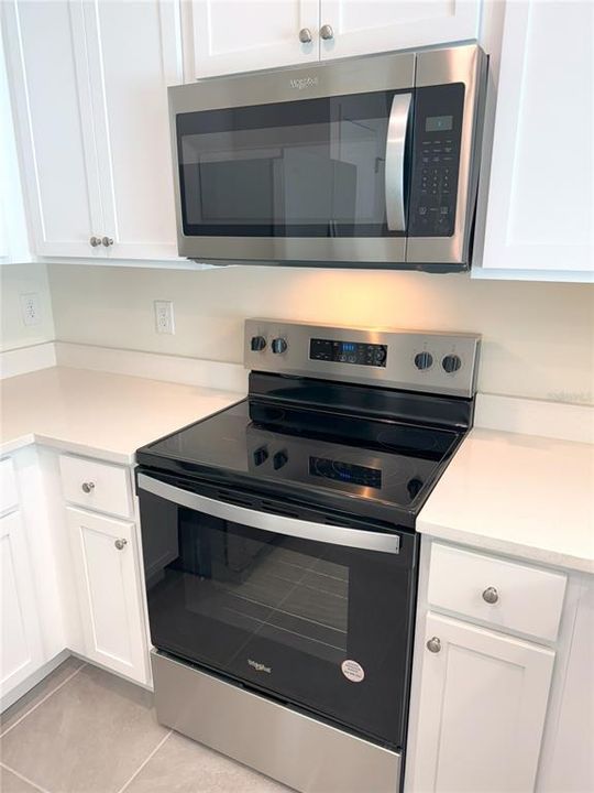 Kitchen - Stainless Steel Whirlpool Microwave & Range Stove