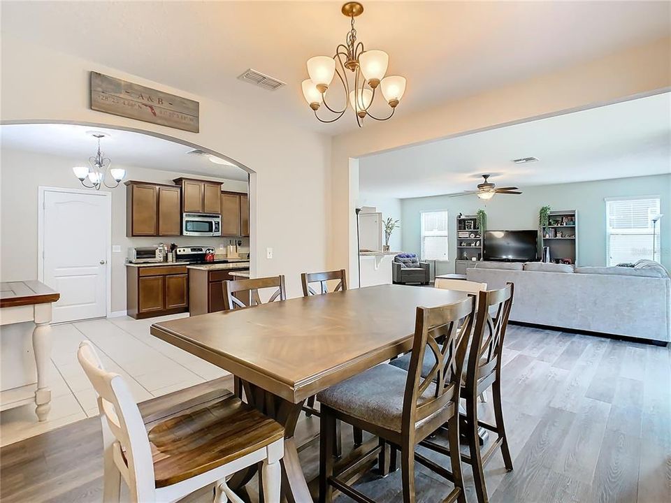 Dining Room w/Kitchen and Living Room