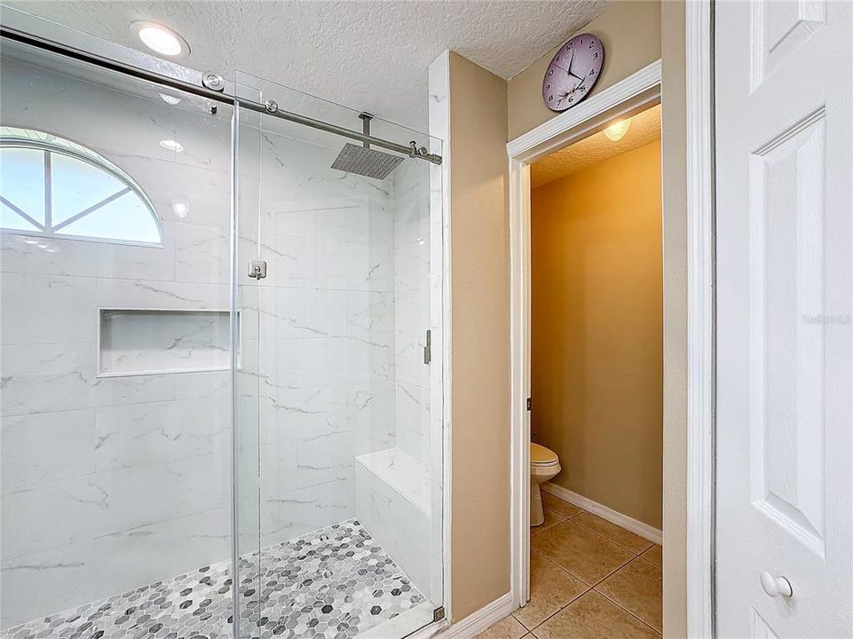 Owners En-Suite Bath with large Walk-in Shower and Private Water Closet