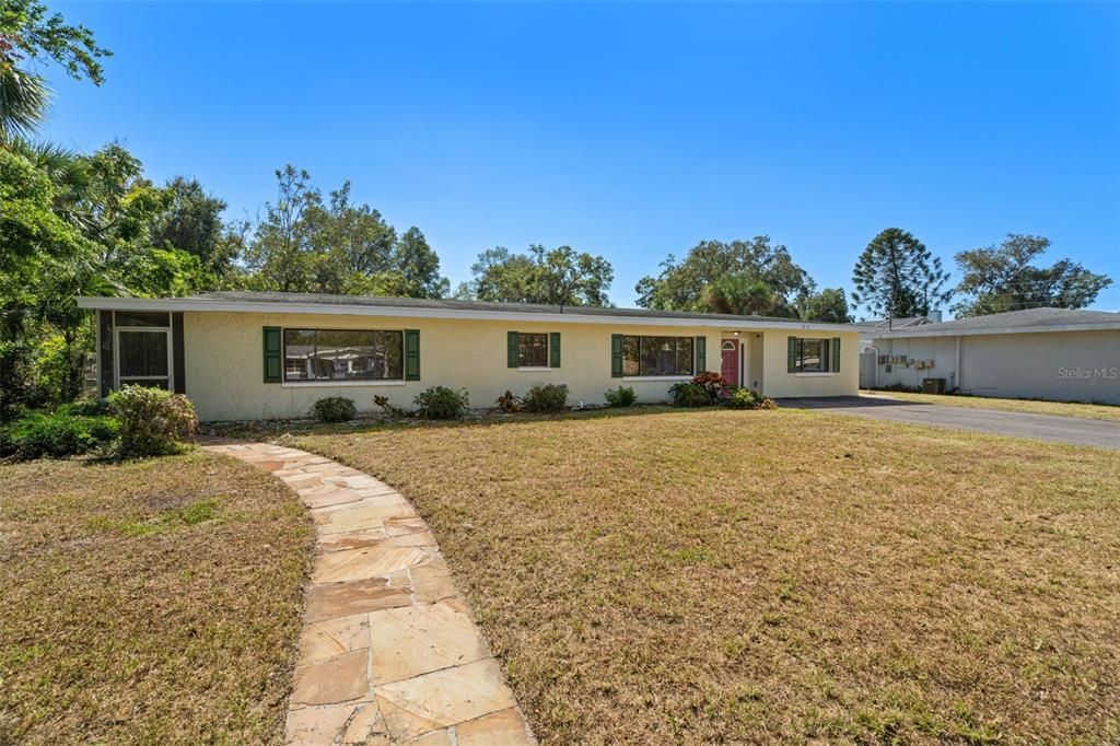 Front of home, sidewalk to side entrance