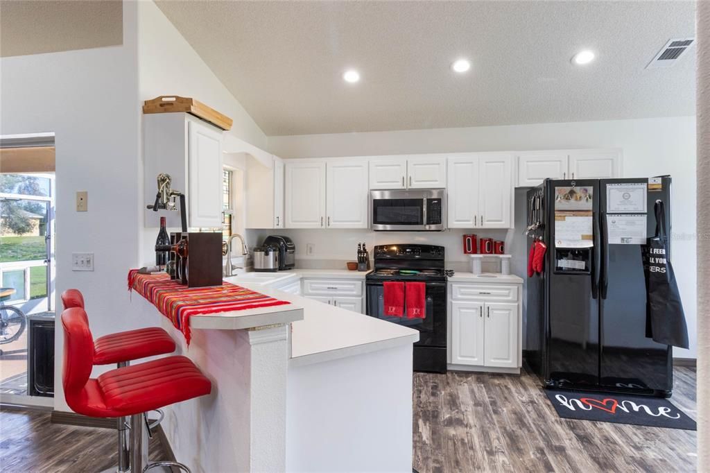 Kitchen features White Cabinetry