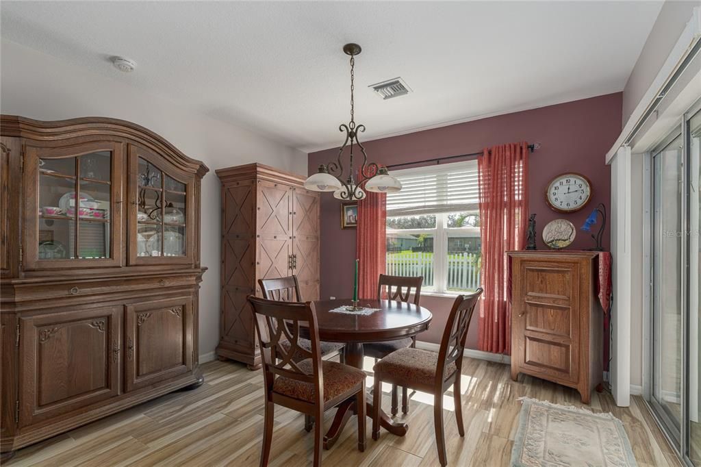 Dining Room w/Sliders to Screened Porch on Right