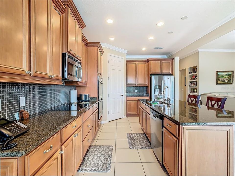 GOURMET KITCHEN WITH STAINLESS APPLIANCES