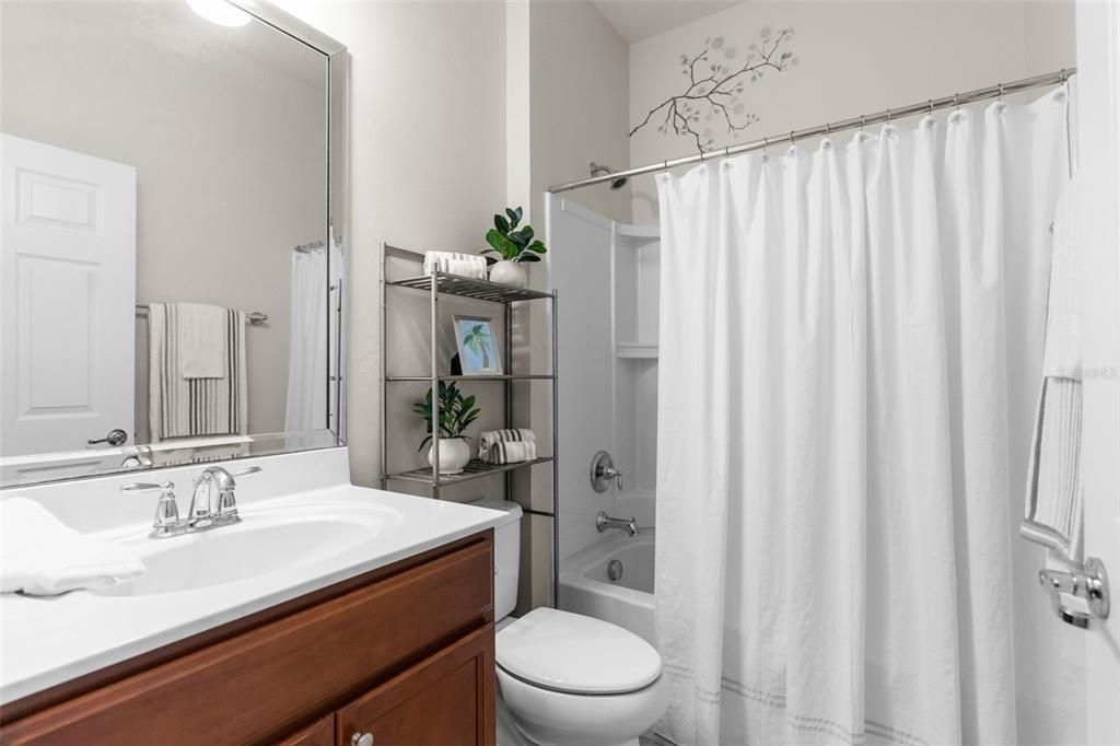 Guest bath located between the bedrooms