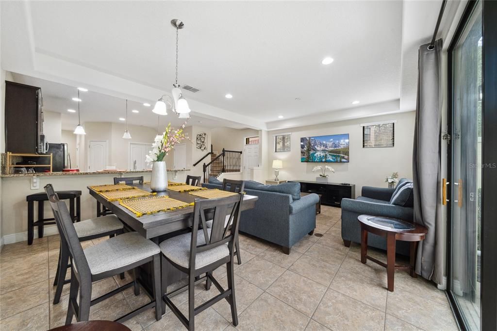 Dining room viewing living and kitchen.