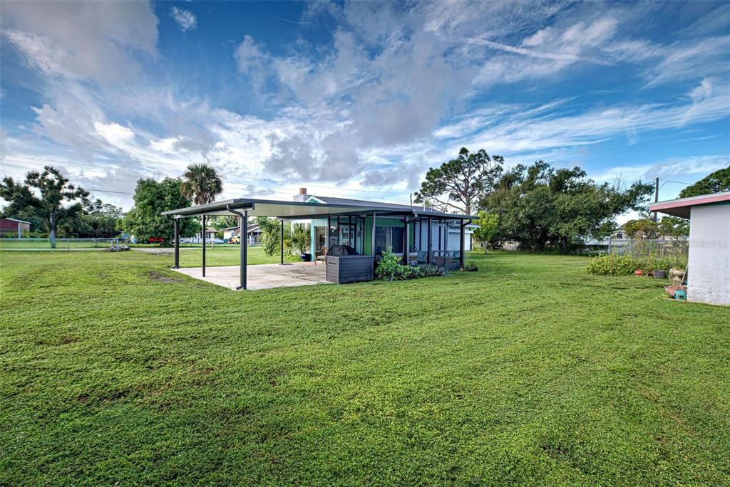 Big house with a view of the lanai and carport