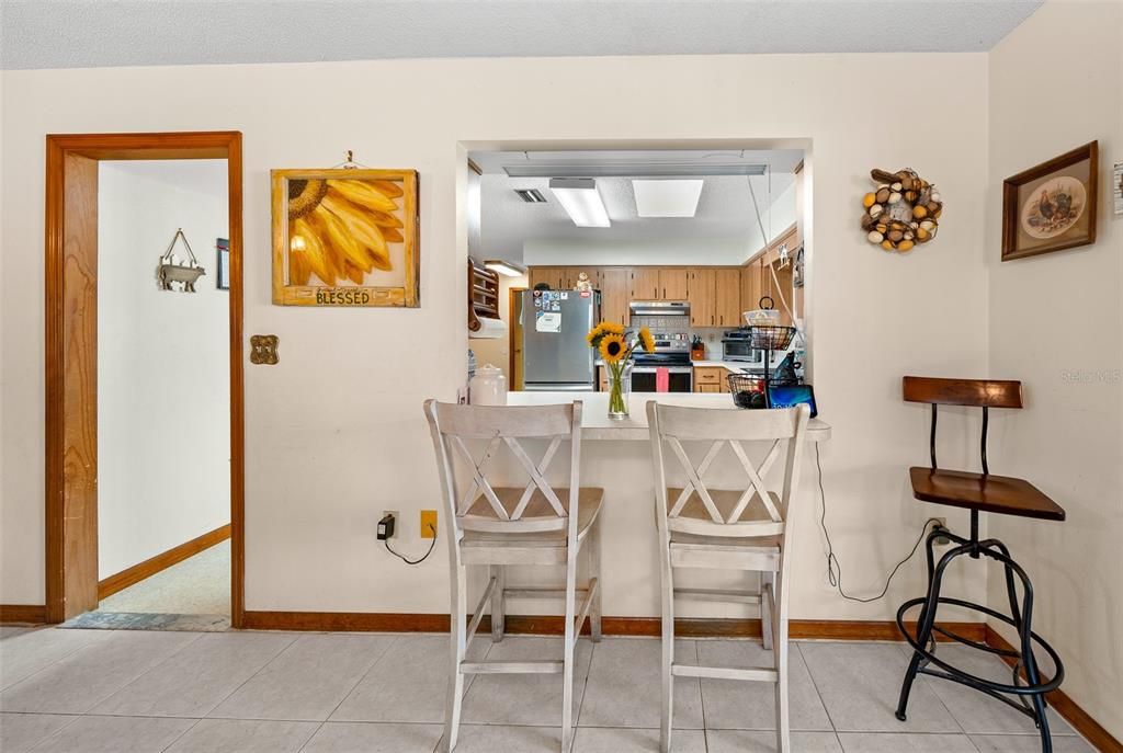 Bar looking into Kitchen