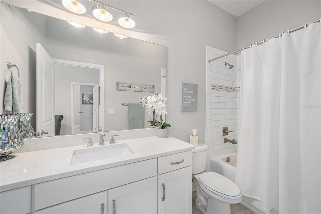 Shared guest bath is large enough for busy family!