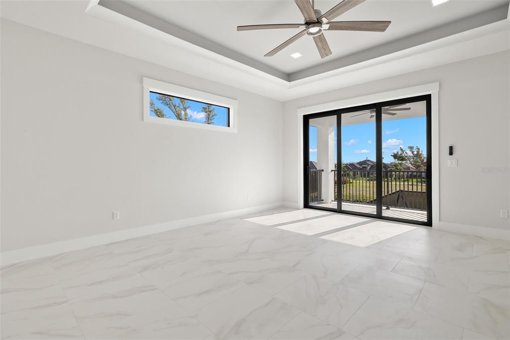 2nd story bonus room with 10 ft sliders to balcony