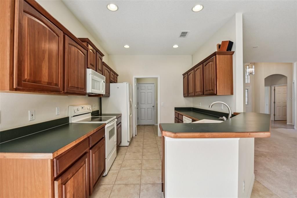 Generous Sized Kitchen with lots of potential!