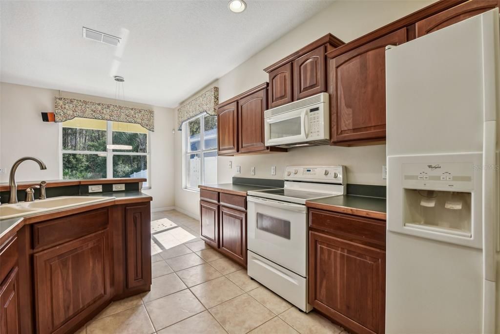 Generous Sized Kitchen with lots of potential!