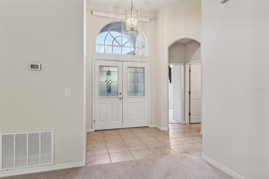 High Ceilings and Lots of Natural Light Through the House!