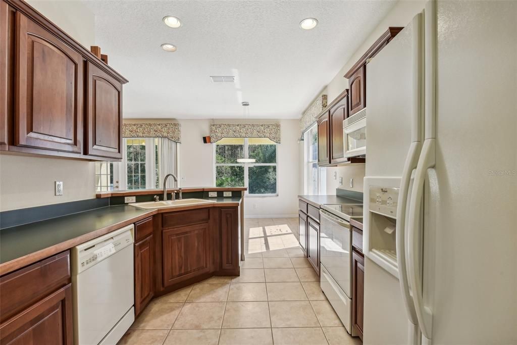 Generous Sized Kitchen with lots of potential!