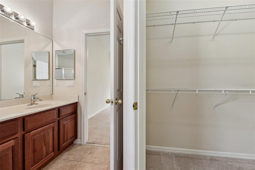 Large Primary Bathroom with Double Vanity, Garden Tub, Stand Up Shower, Water Closet and Natural Light!