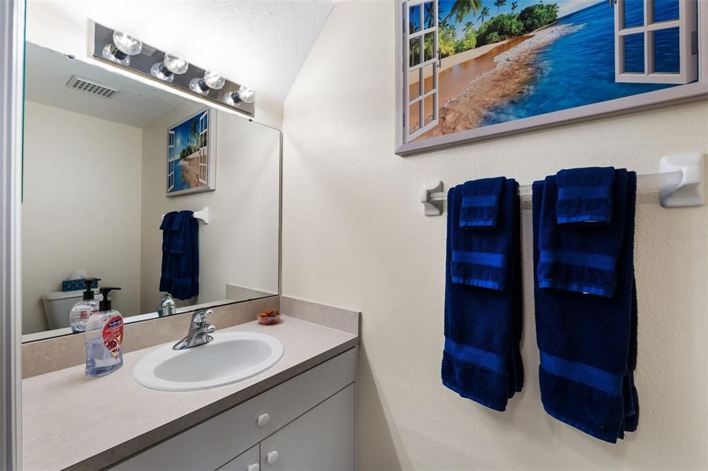 Guest Bathroom situated towards from of the home.