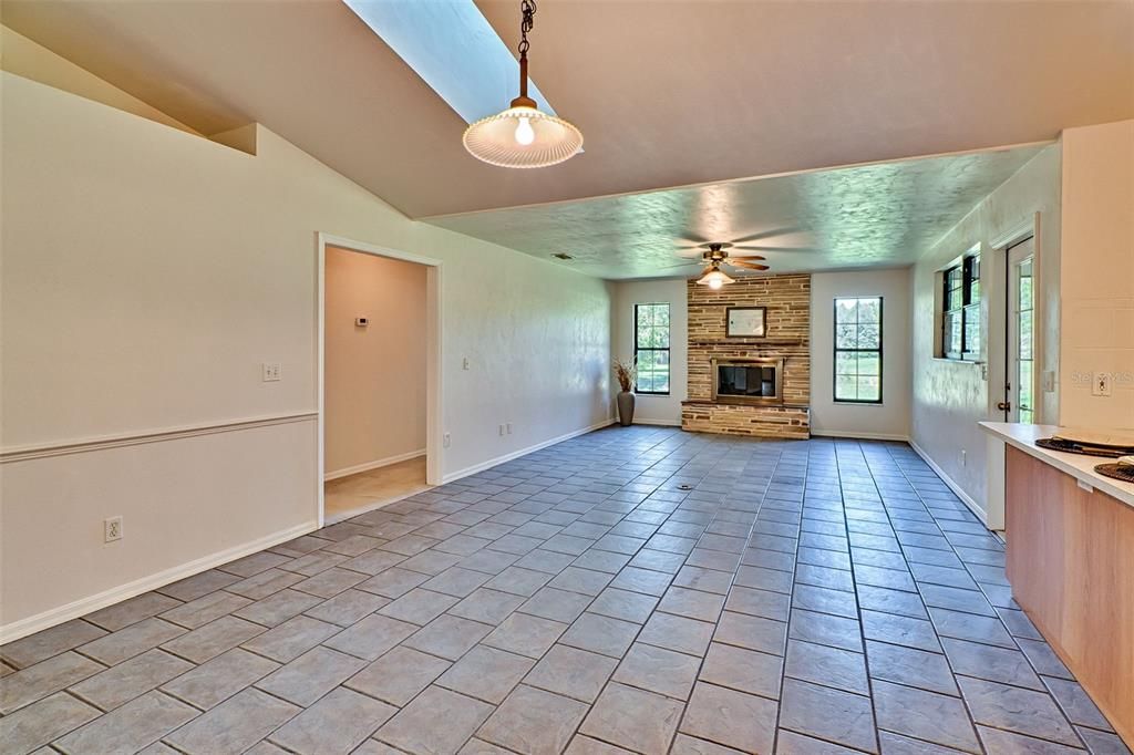 family room with wood burning fireplace