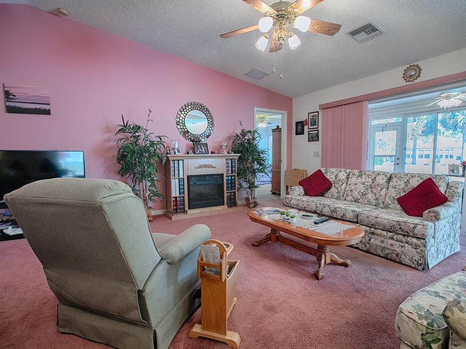 LIVING ROOM WITH A VIEW TO THE LANAI