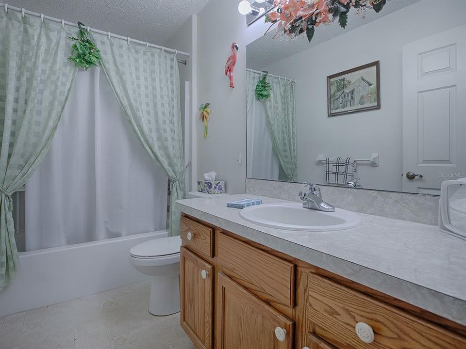 GUEST BATH HAS A TUB/SHOWER COMBO