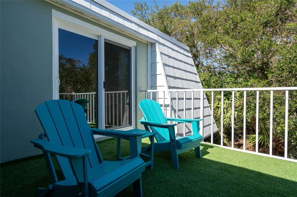 Patio outside of bedrooms.