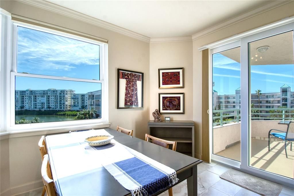 View of water in kitchen and access to front balcony