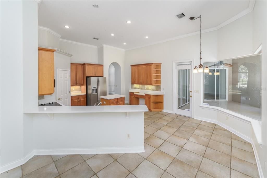 This bright island kitchen makes cooking a delight!