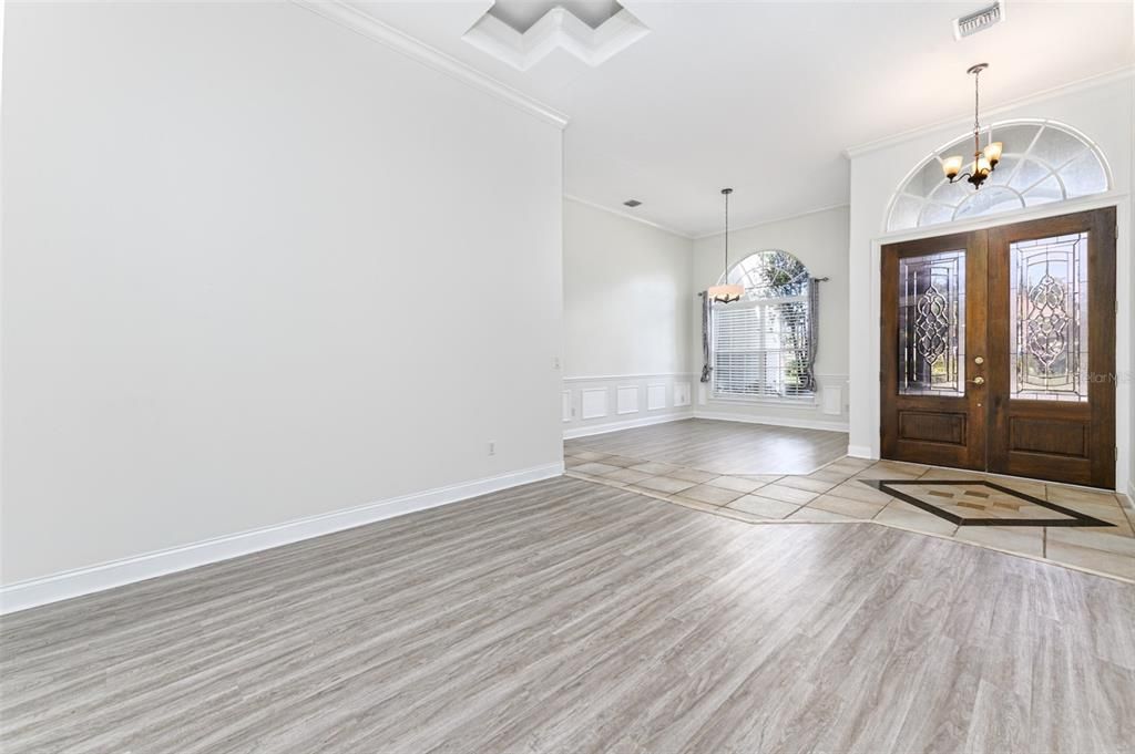 The formal living room is open to the formal dining room.