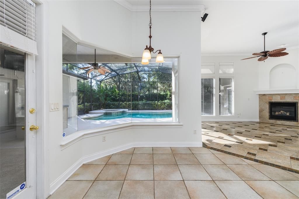 The mitered glass window in the breakfast nook allows plenty of natural light.