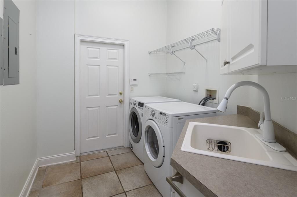 The washer and dryer stay!  The utility sink is so handy!