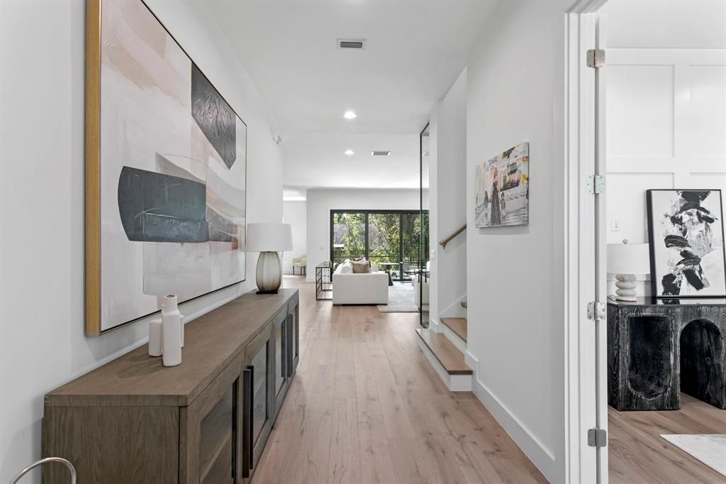 Grand foyer into an expansive open-concept living area!