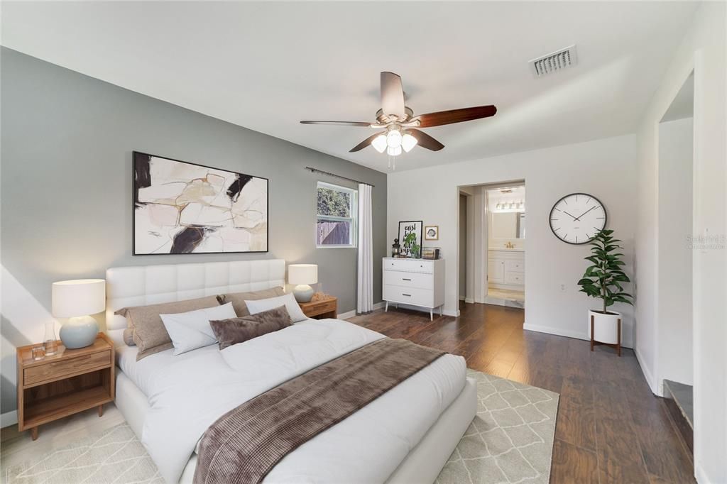 There are two guest bedrooms sharing a full guest bath and your PRIMARY SUITE features DUAL CLOSETS and a private en-suite bath, also renovated to reflect the same fresh modern color palette as the kitchen. Virtually Staged.