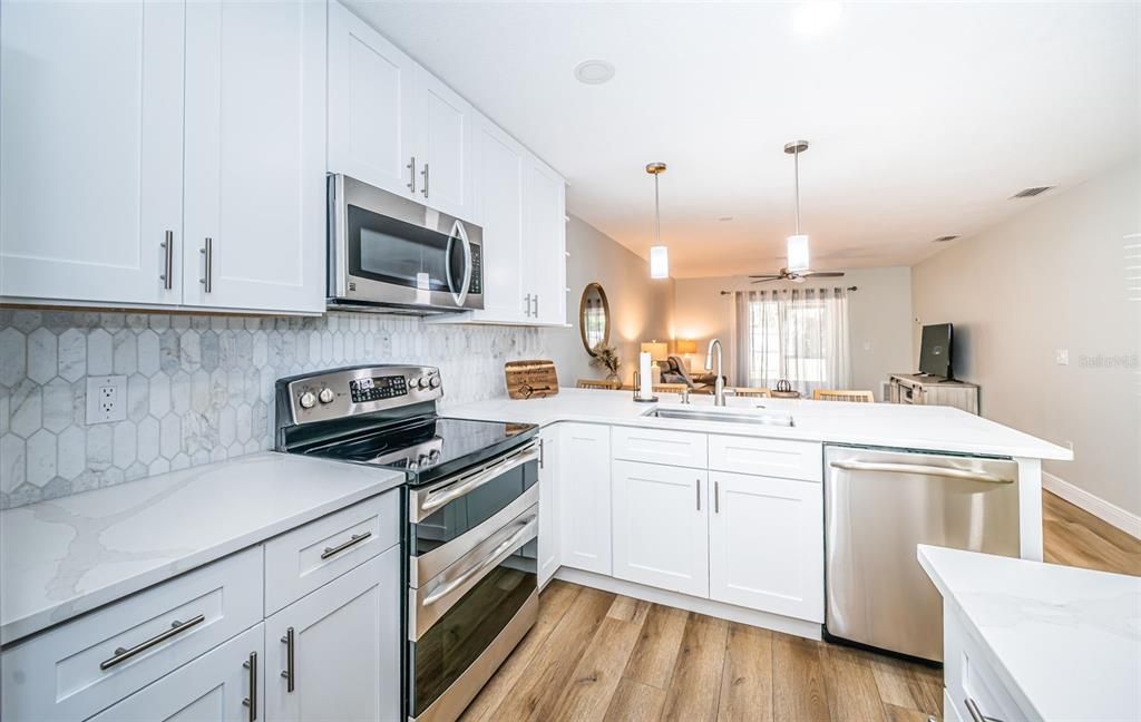 Quartz Counters & Marble Backsplash